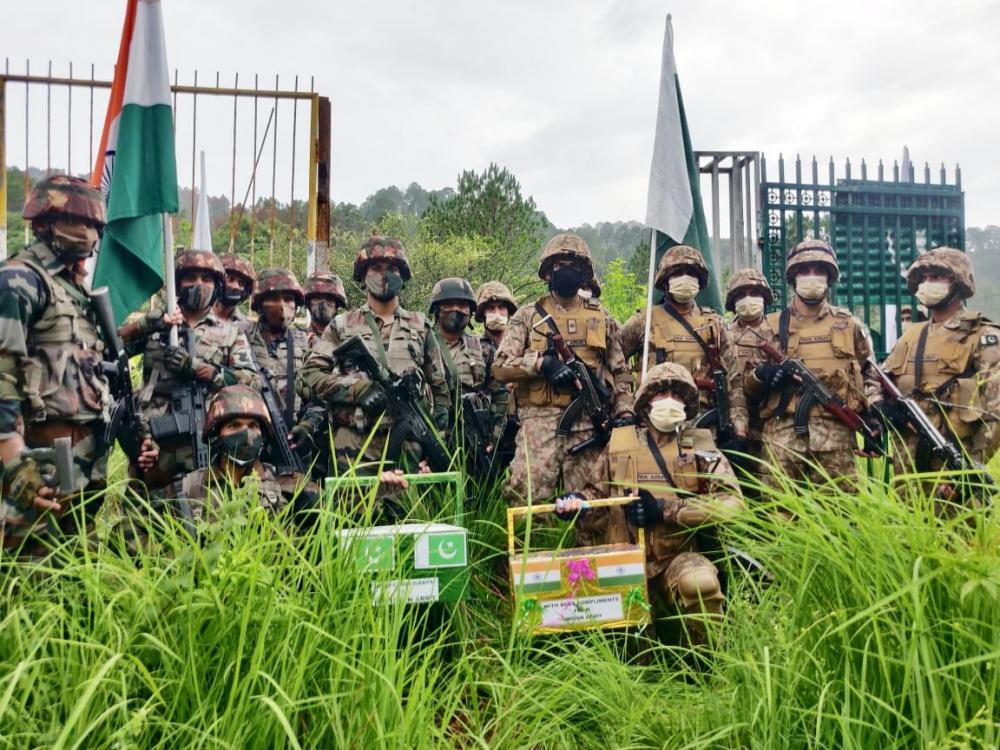 The Weekend Leader - India, Pakistan armies share sweets at Line of Control on Eid